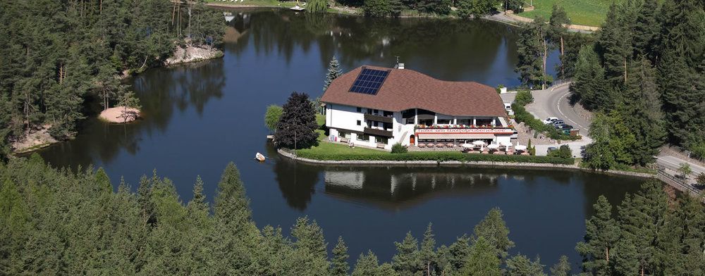 Hotel Am Wolfgrubenersee Soprabolzano Exterior photo